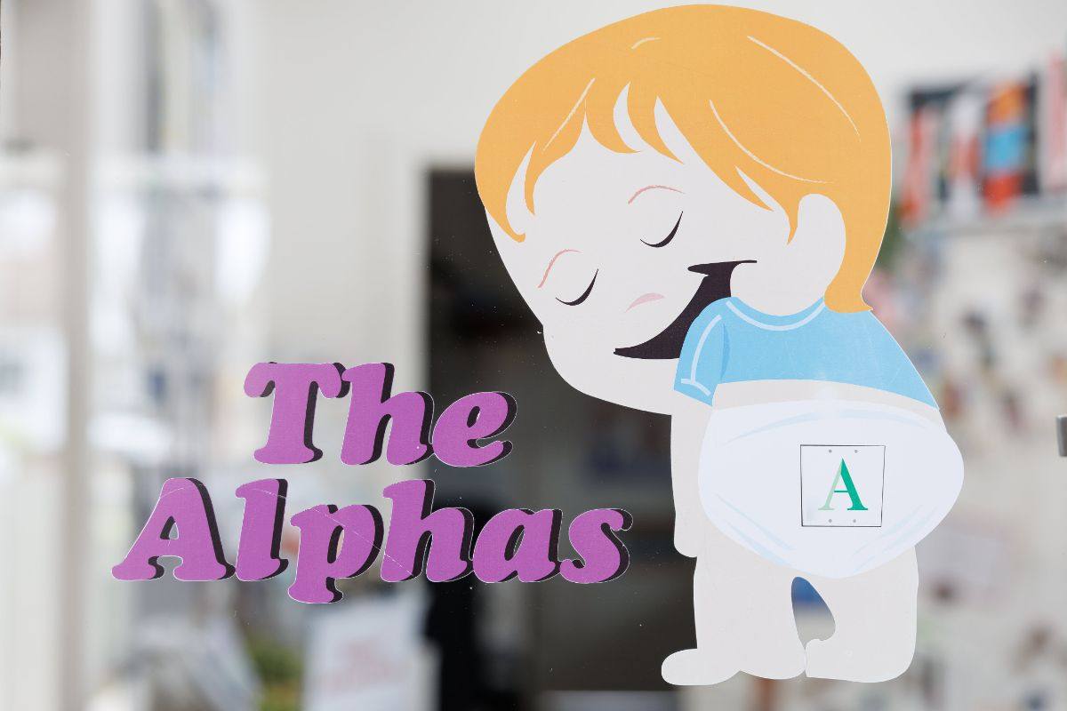 The Alphas room sign