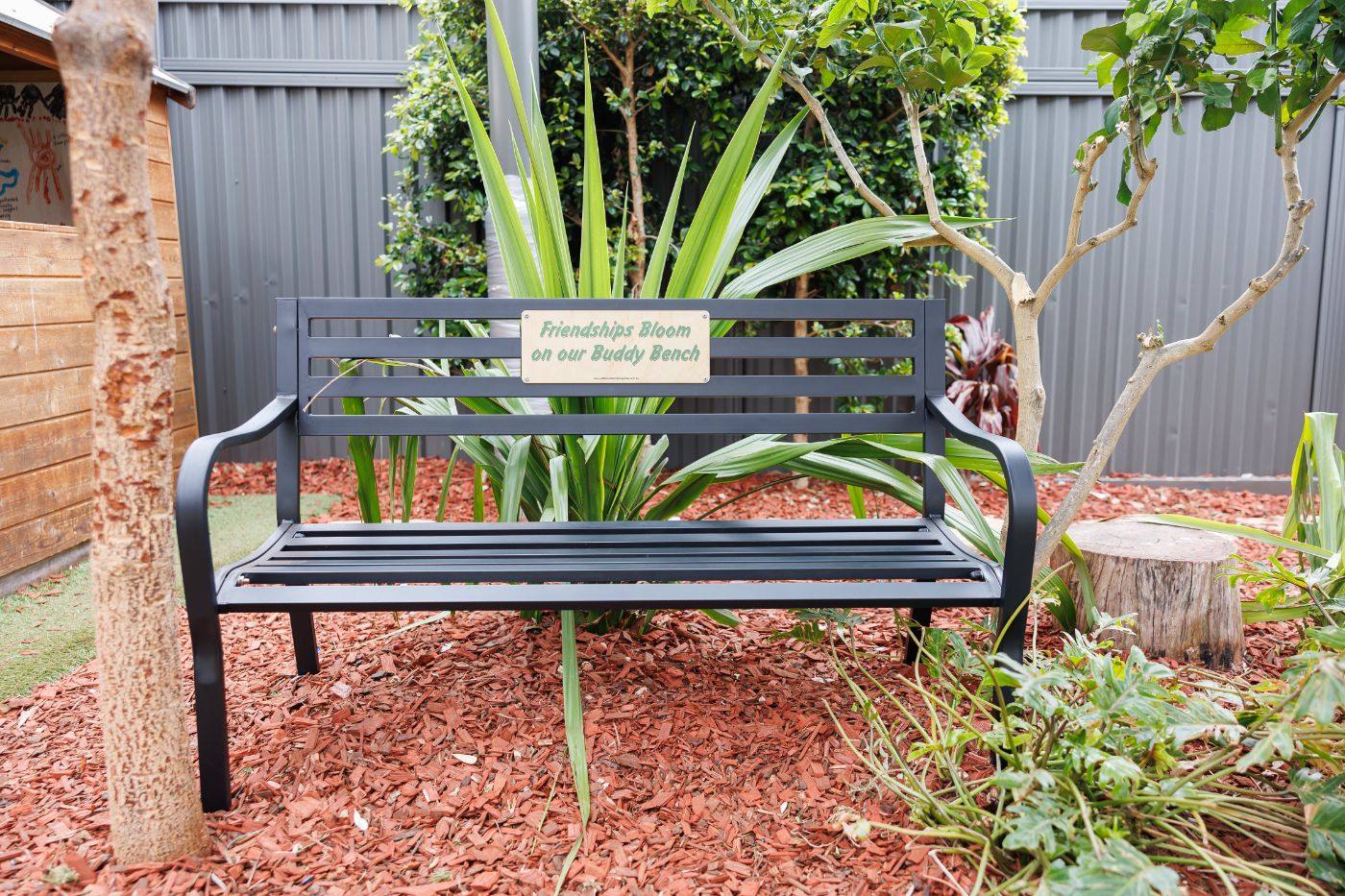Garden bench among native plants